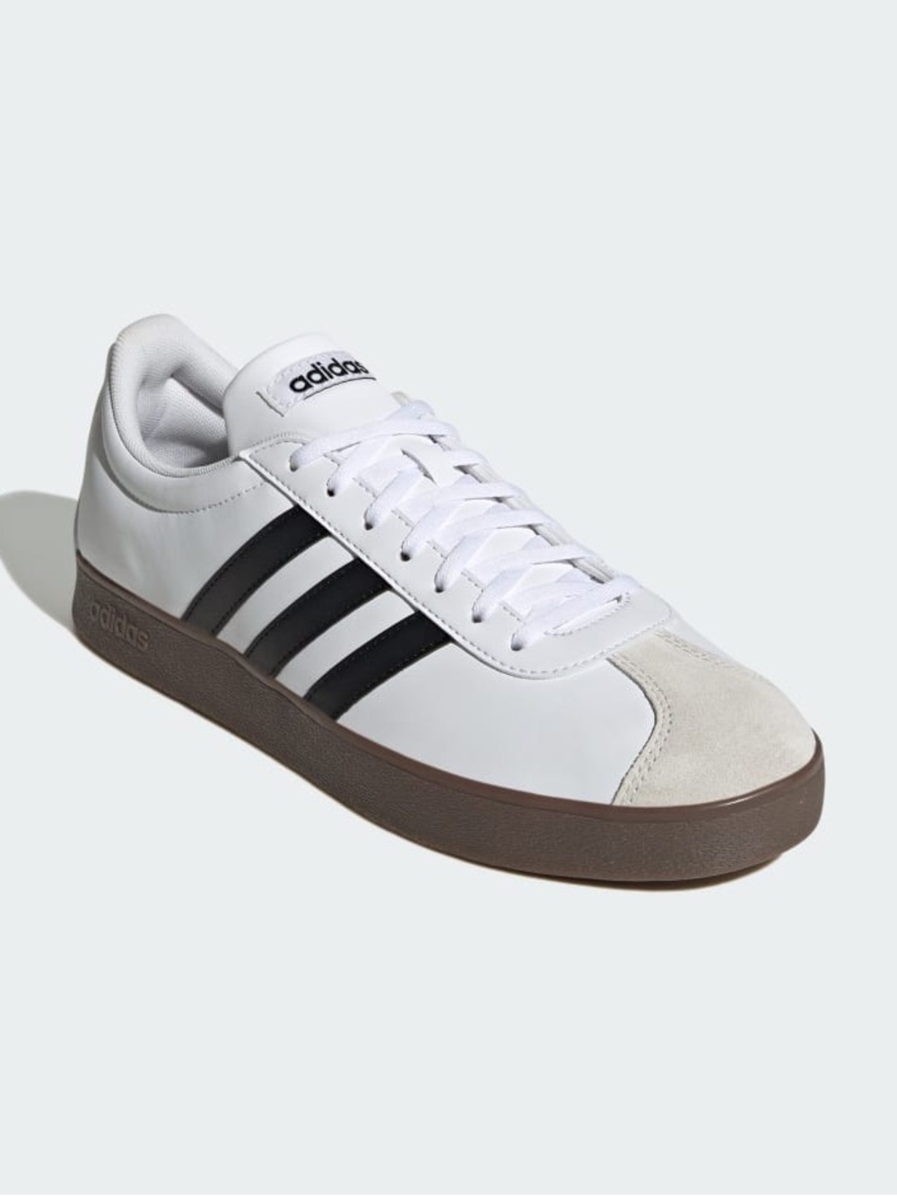 Adidas White Sneakers with Black Stripes and Brown Sole